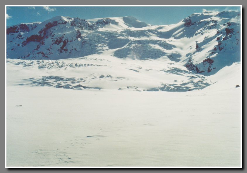 Gigjokull glacier covered in snow. The lagoon at its roots is frozen solid and covered in snow. We will be trying to reach the top from the other side next day.