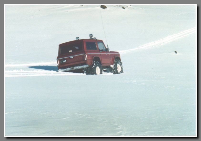 Scary situation. The Bronco is falling through the snow bridge we are using to cross the glacier river that exits the lagoon.